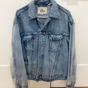 Levi’s Blue Jean Jacket, oversized and has the bomber-jacket shape. SIZE 2.